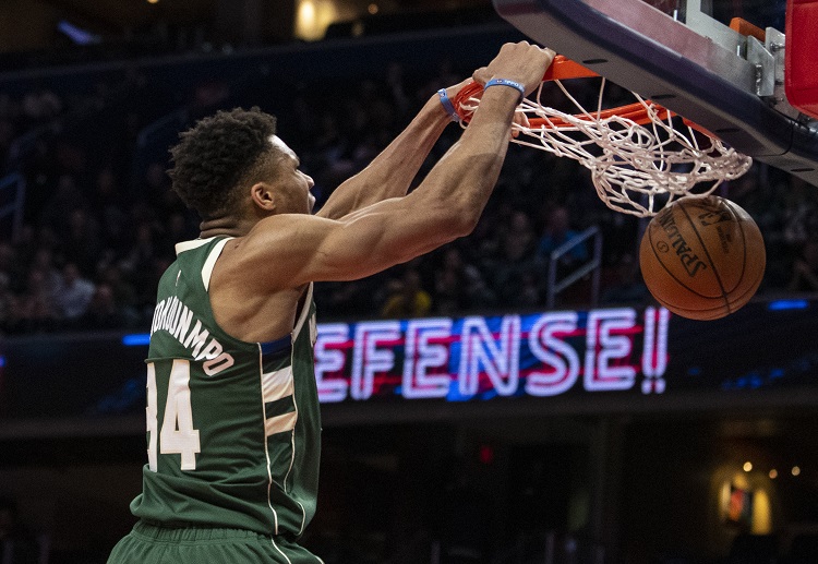 Milwaukee Bucks forward Giannis Antetokounmpo dunks the ball during an NBA clash against the Wizards