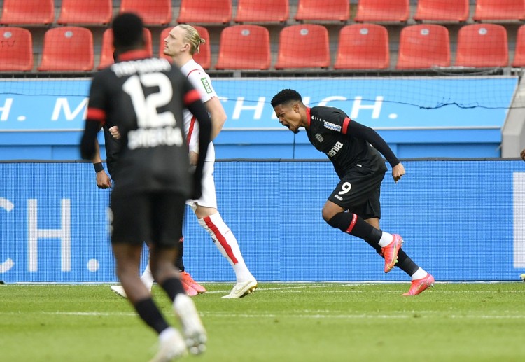 Bayer Leverkusen’s Leon Bailey aims to score against Bayern Munich in Bundesliga