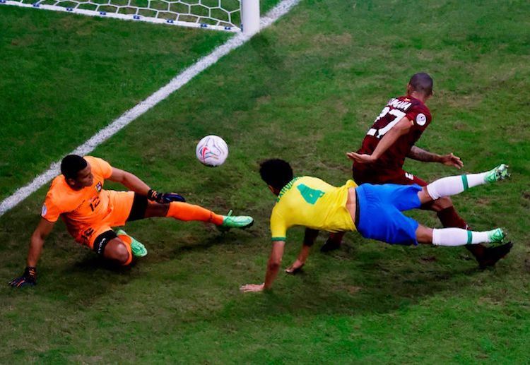 Marquinhos scores a goal to give Brazil an initial lead in their Copa America opener against Venezuela