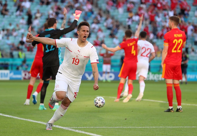Switzerland's Mario Gavranovic celebrates after his side held Wales into a 1-1 draw