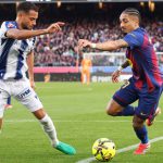 FC Barcelona’s Raphinha contests the ball with Levante’s Jeremy Toljan in a tense La Liga fixture